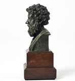 Artist-made detailed collectible bust of Stoic philosopher Marcus Aurelius, in pewter on a wooden base, left profile view.