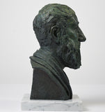 Artist-made detailed collectible bust of Stoic philosopher Zeno of Citium, in bronze on a marble base, right profile view.